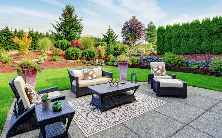 Picture of a patio with lawn chairs and coffee table