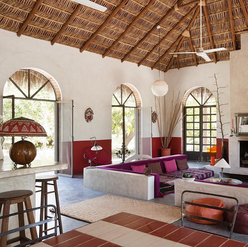 a living room with a polished concrete floor