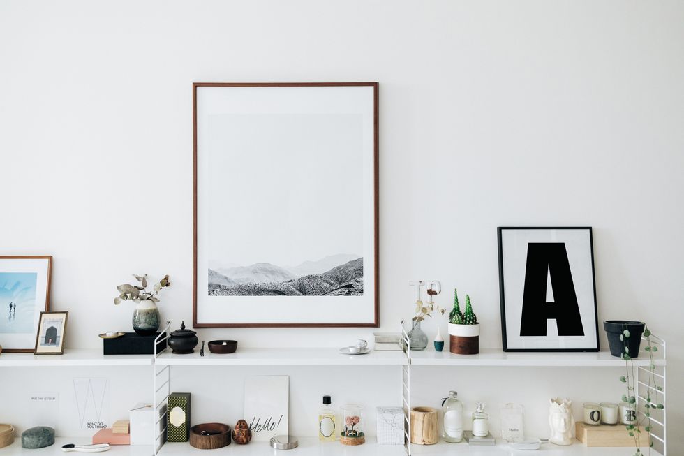 a well decorated and stylish shelving unit