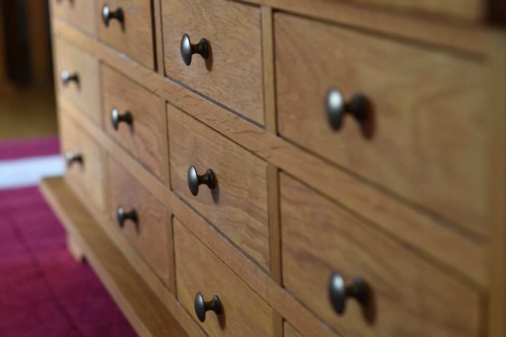 Picture of a chest of drawers with handles