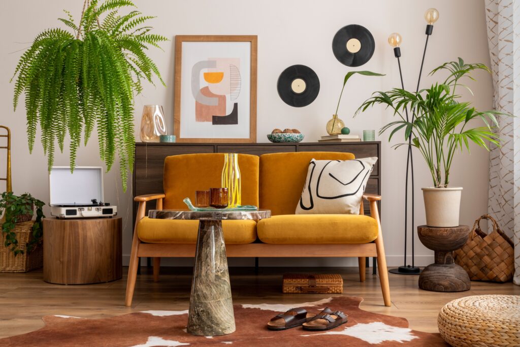 Picture of a living room with vintage decor and colourful sofa