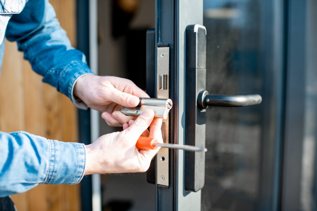 Picture of a locksmith installing a lock