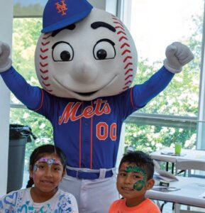 The children and adults had a great time with Mr. and Mrs. Met, who welcomed them.