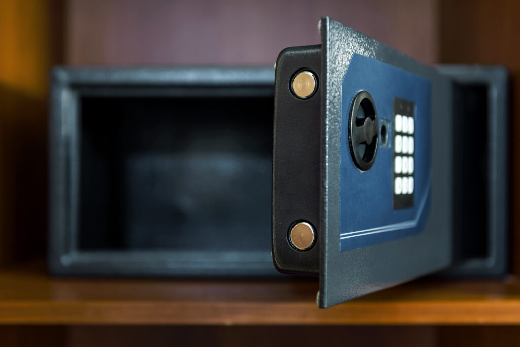 Picture of a safe in a drawer with open door and empty inside