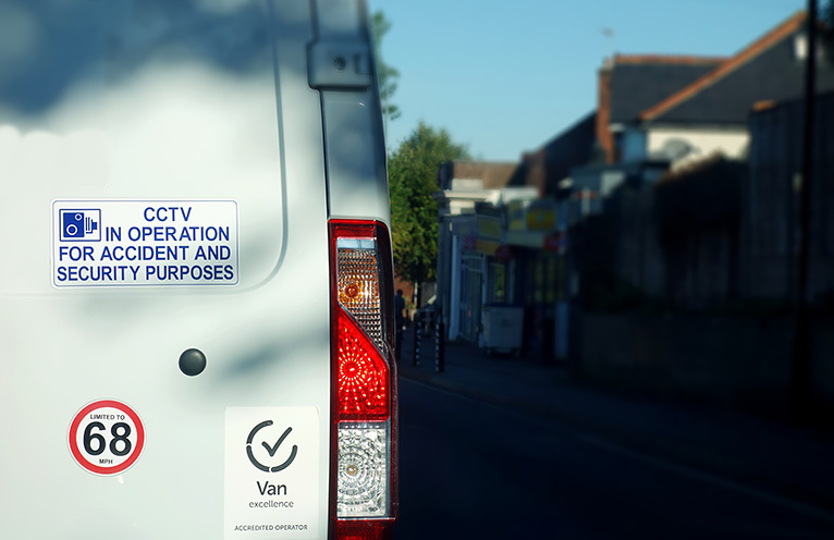 'CCTV in operation' sticker on the rear of a van