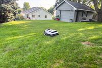 The Ecovacs Goat A3000 LiDAR Robot Lawn Mower mows a lawn