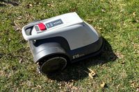 The Eufy Robot Lawn Mower E15 on grass
