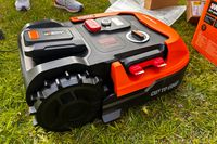 A view of the WORX WR147 Landroid Robotic Lawn Mower from the side