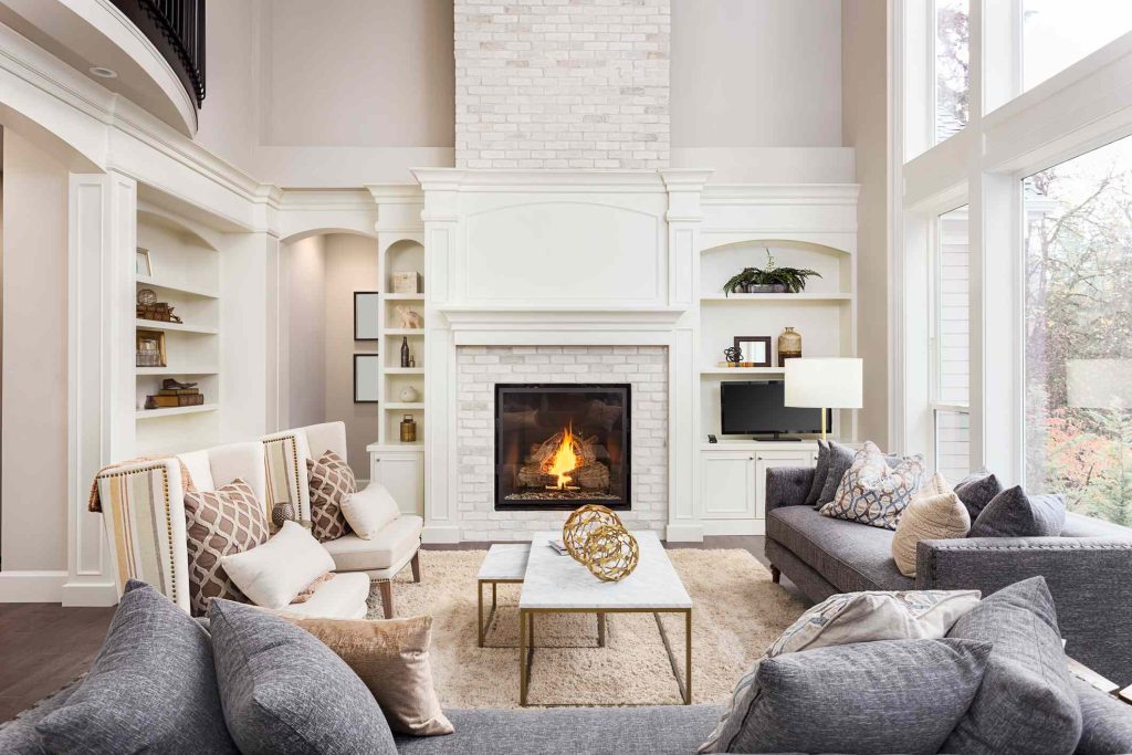 6 Easy Ways to Refresh an Outdated Fireplace Without Knocking It Down, According to Contractors